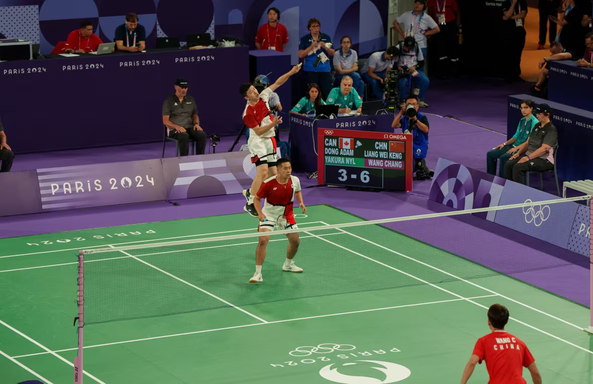 Adam Dong plays badminton for Canada