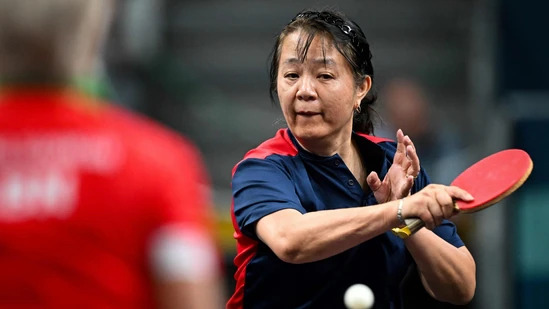 Zheng Ziying plays table tennis for Chile.