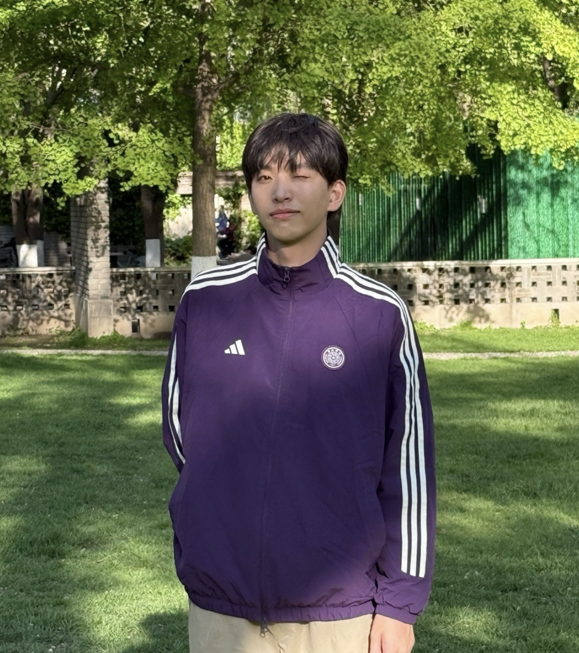 RADII showcases the Tsinghua University and adidas sportswear collaboration in purple.