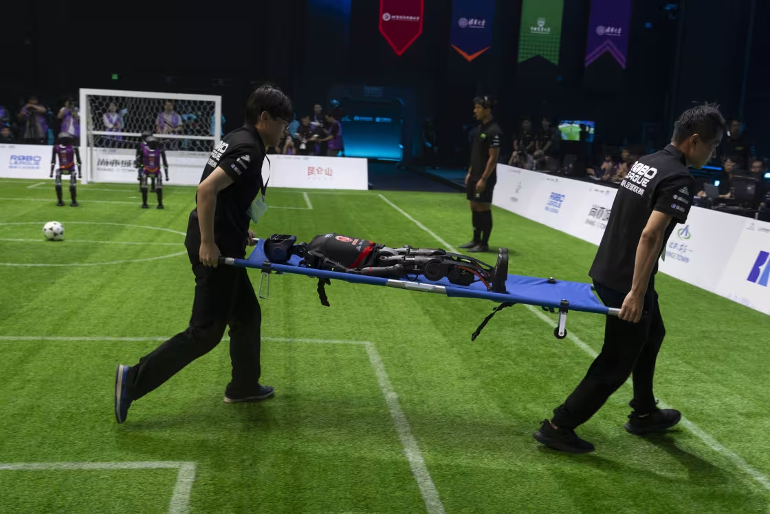 RADII showcases AI robots playing soccer in Beijing.