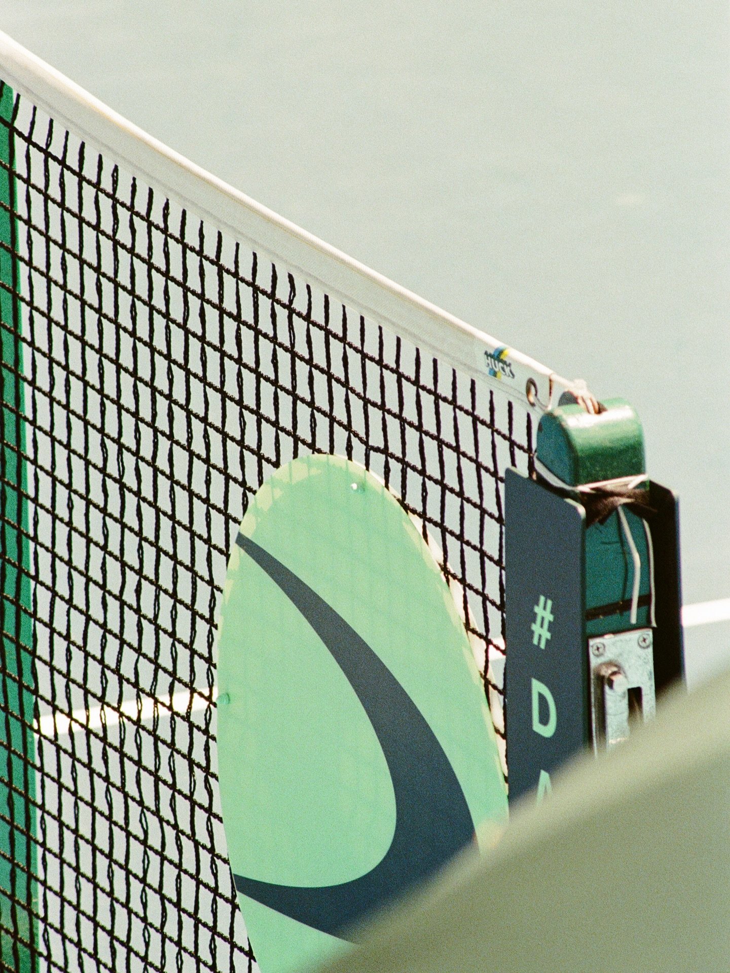 RADII profiles film photography from Enoch Ho AKA Casual Grains who captured pro tennis player Coleman Wong during HK Davis Cup.