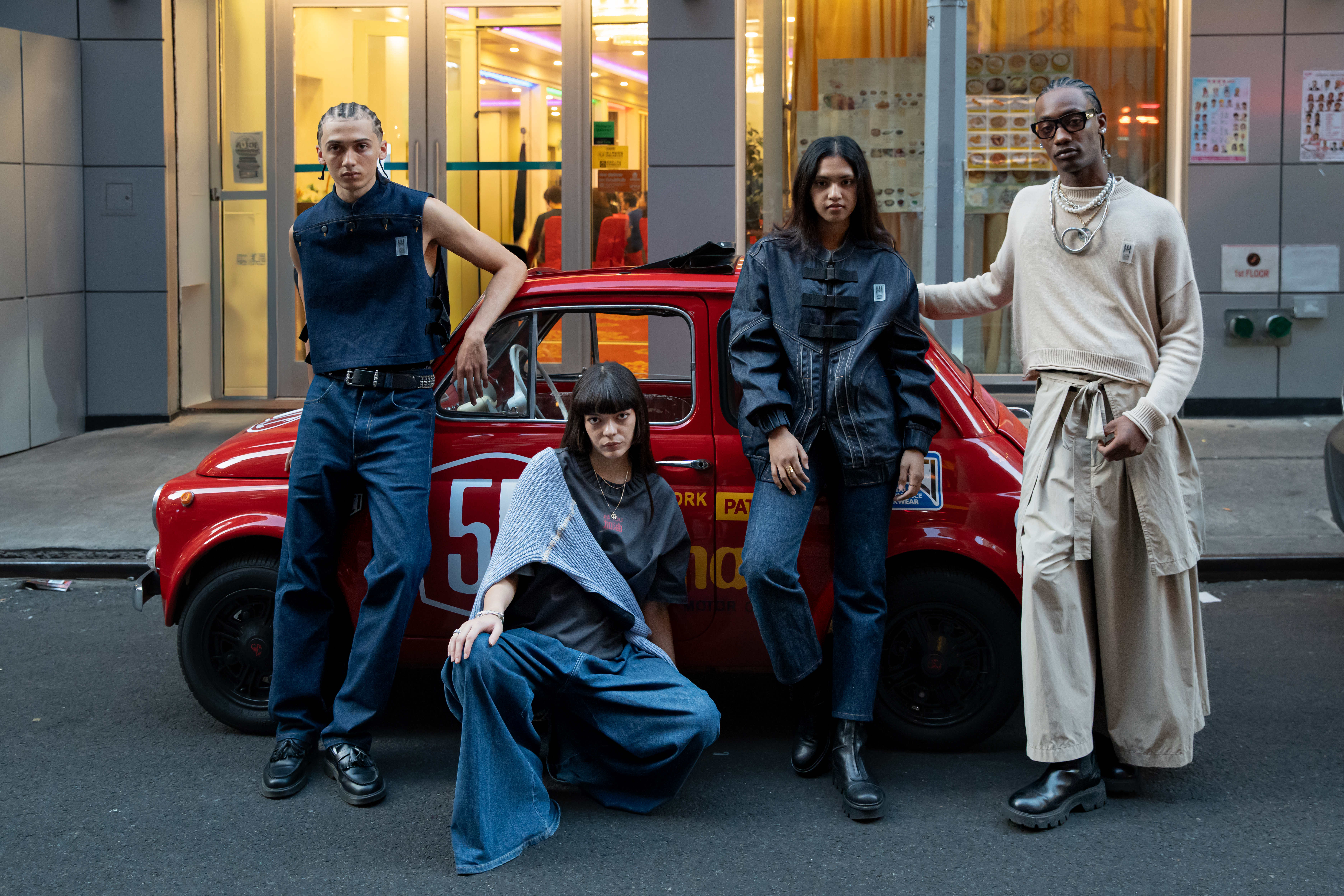 SUM LONDON makes its debut appearance at New York Fashion Week with its JIĀ YÓU collection, highlighting Chinese immigrants' resilience and work ethic.