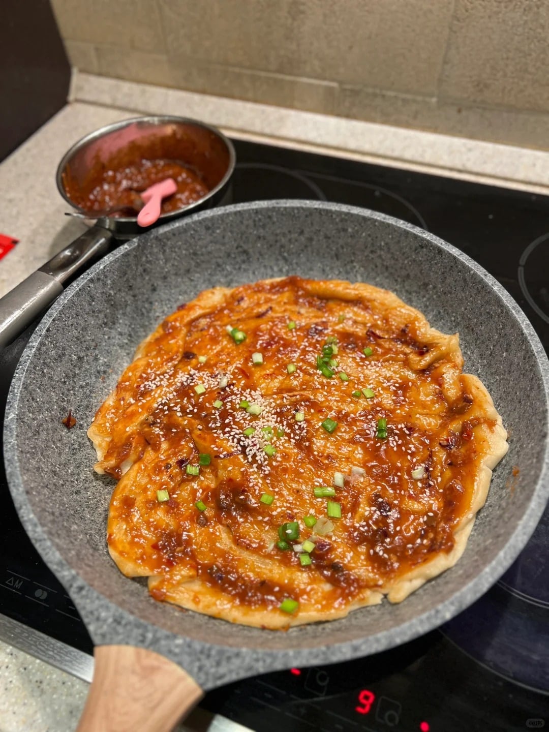 Savory Sauce Pancake prepared in a Chinese student’s kitchen abroad. Photo via Xiaohongshu.