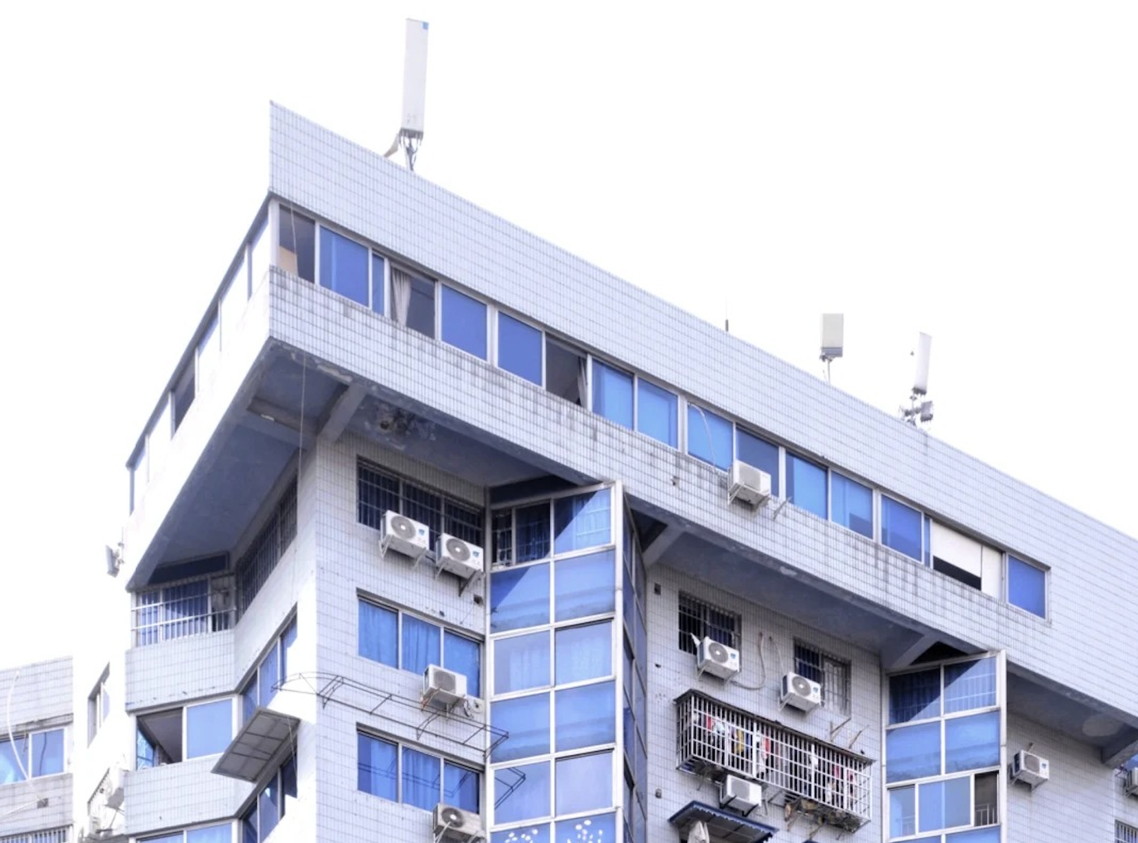 Chinese photographer 铁合西街东 documents turn of the century architecture that is loaded with nostalgia