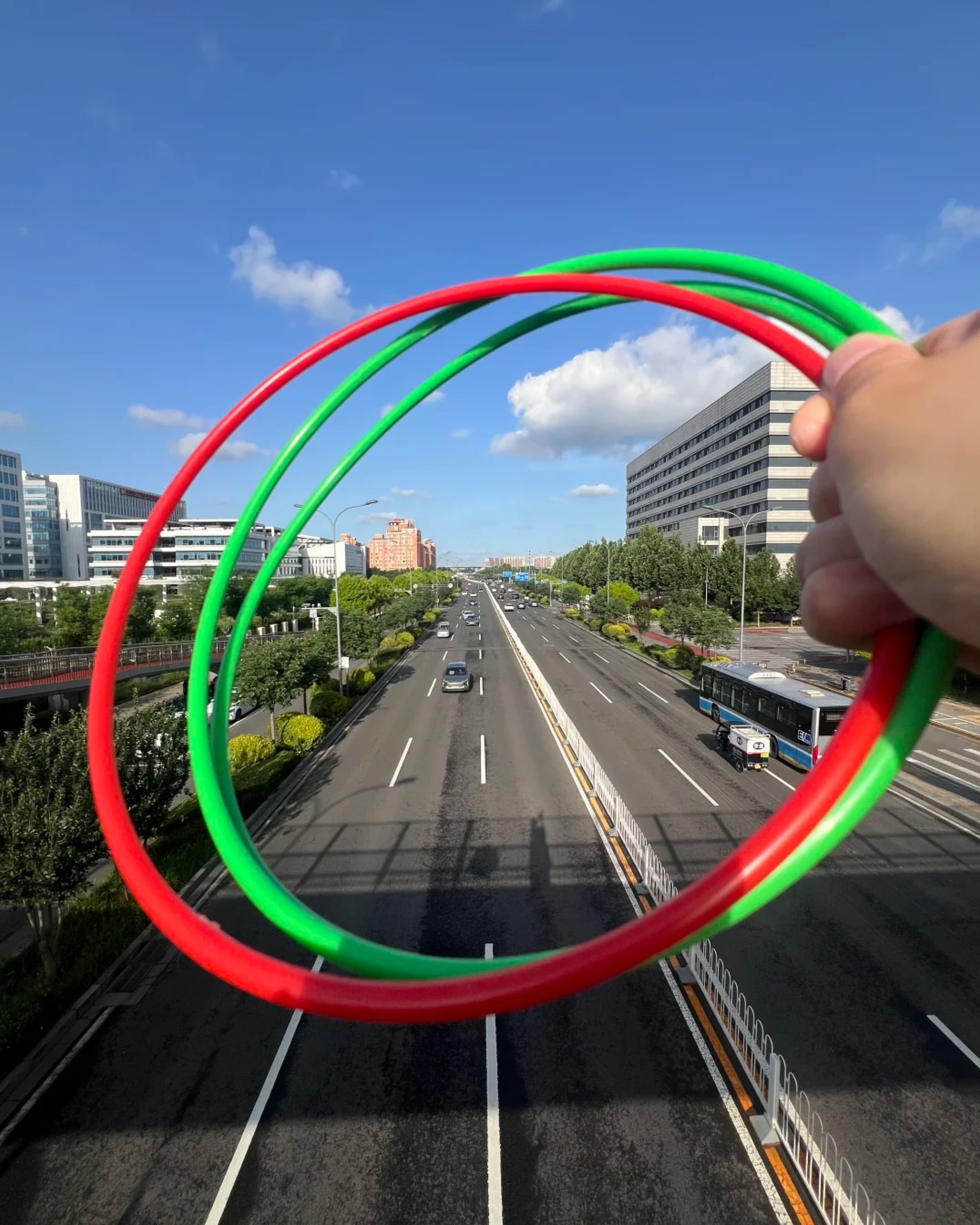 RADII highlights taoquan kids playing ring toss games throughout the city of Beijing.